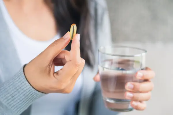 Supplement and glass of water