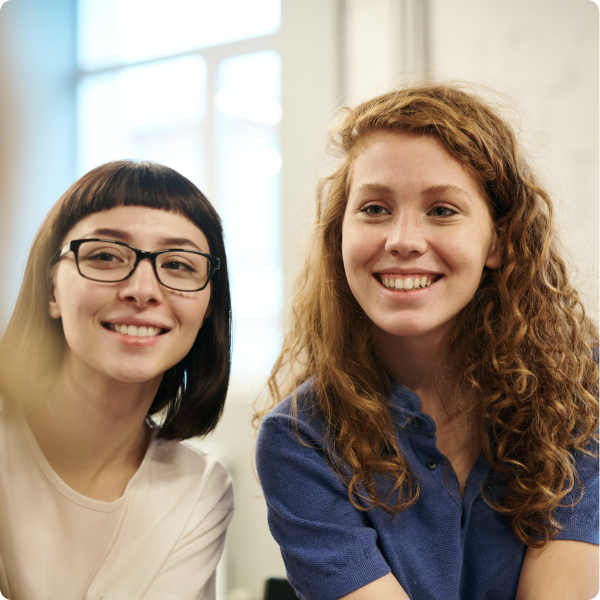 Two women smiling