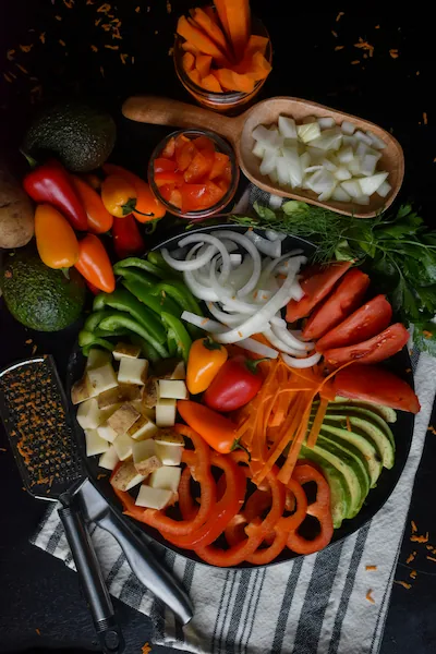 Sliced vegetables prepared in a bowl for cooking